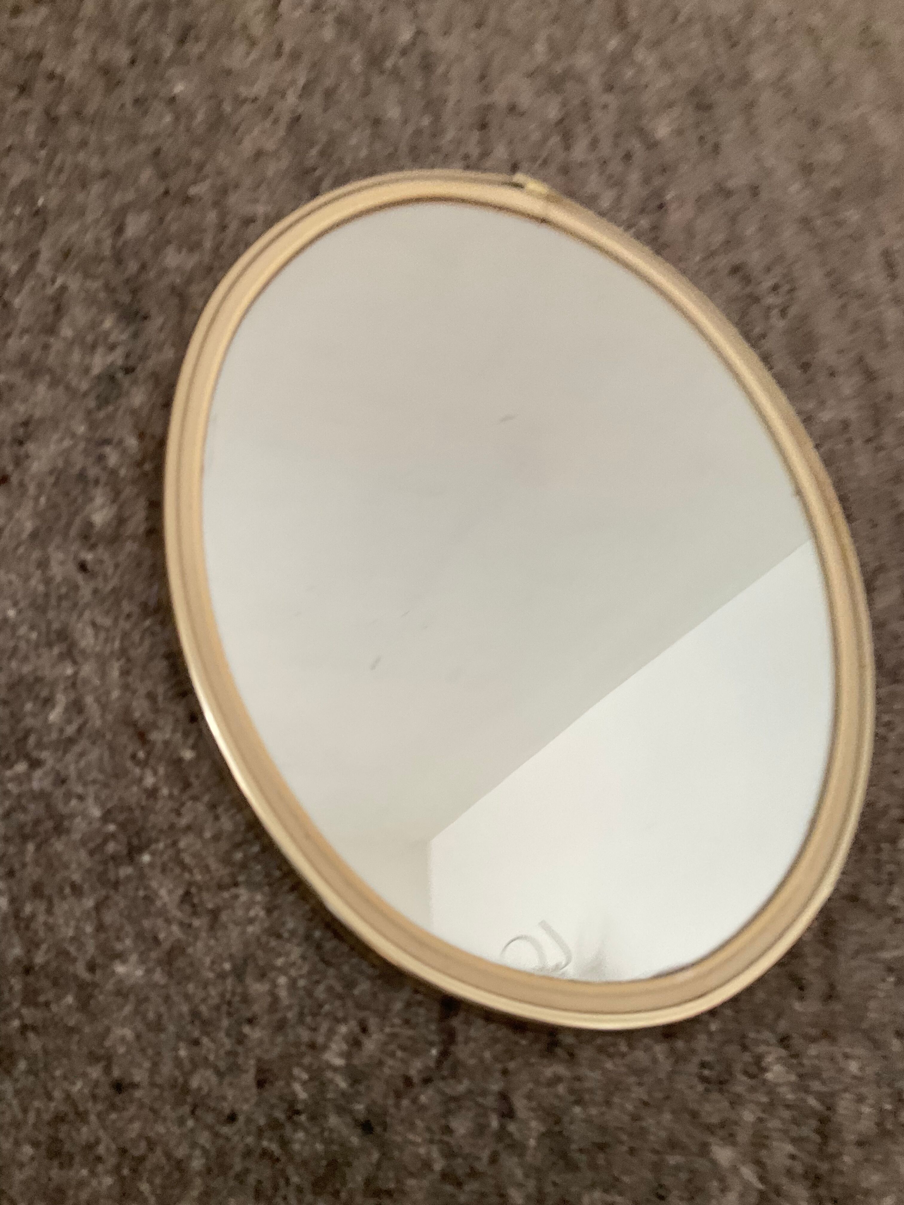Vintage oval mirror from the 60s and 70s