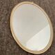 Vintage oval mirror from the 60s and 70s