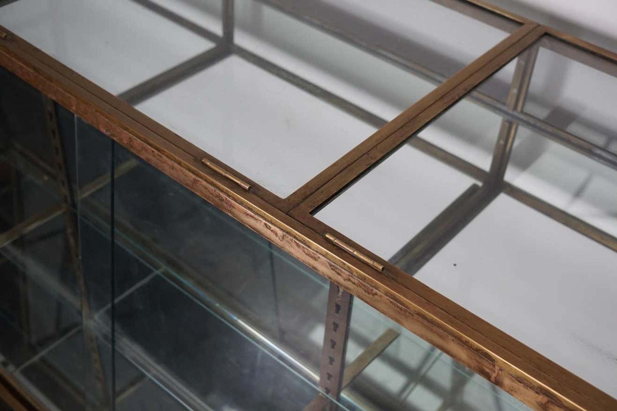 Counter or shop window in oak glass and brass France around 1920