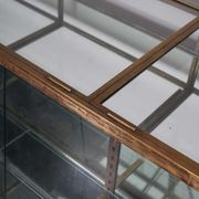 Counter or shop window in oak glass and brass France around 1920