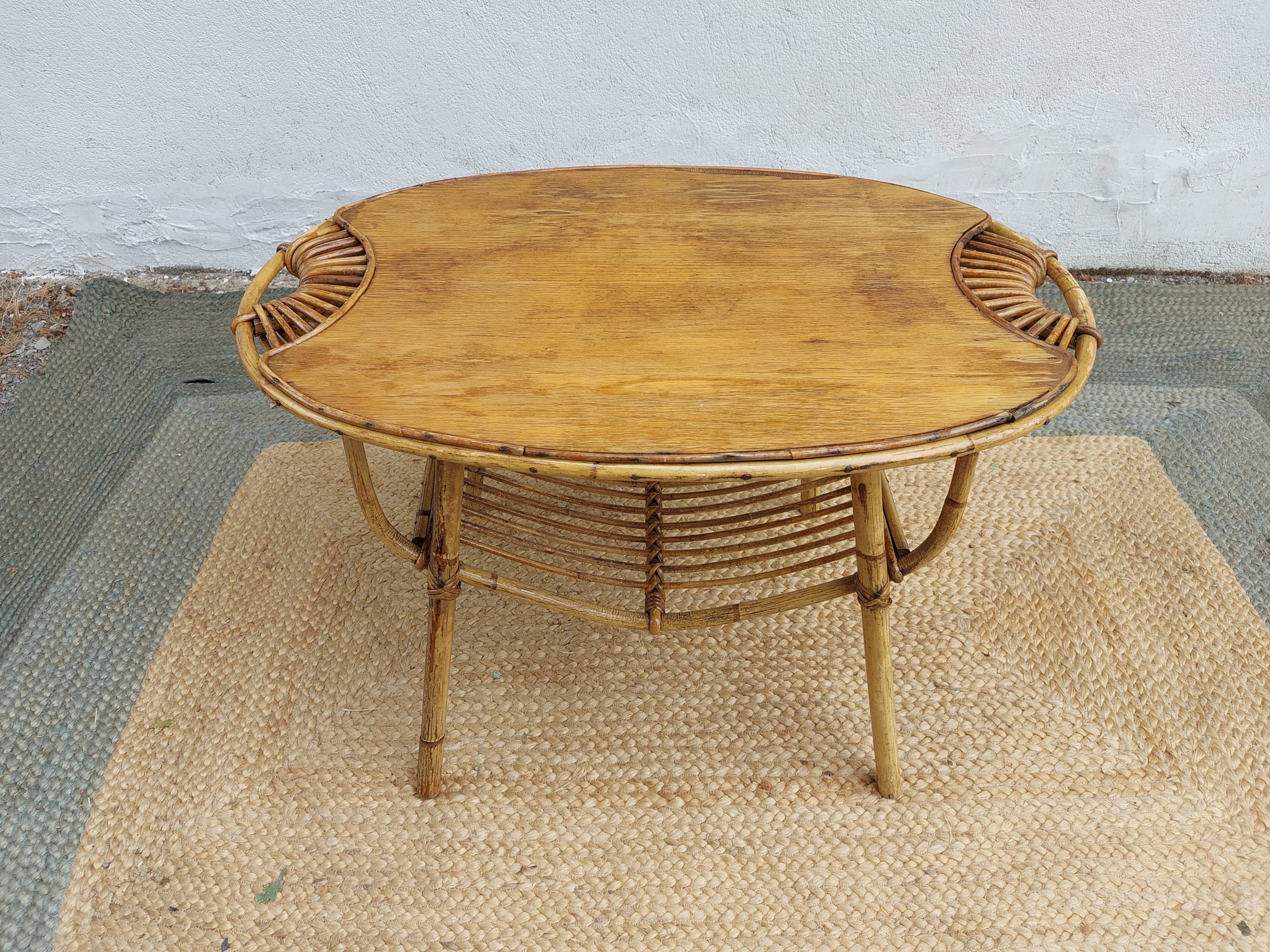 4 armchairs and a coffee table made of rattan and bamboo wood, vintage.