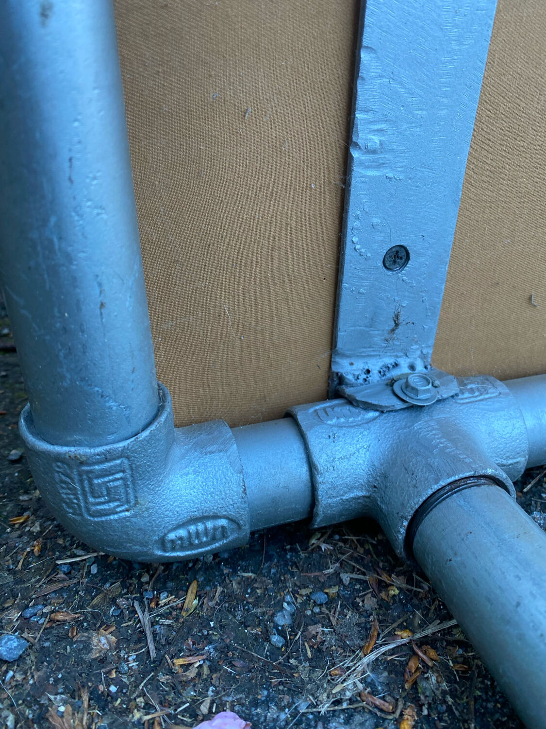 Vintage Italian industrial bench in leather and metal.