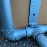 Vintage Italian industrial bench in leather and metal.