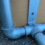 Vintage Italian industrial bench in leather and metal.