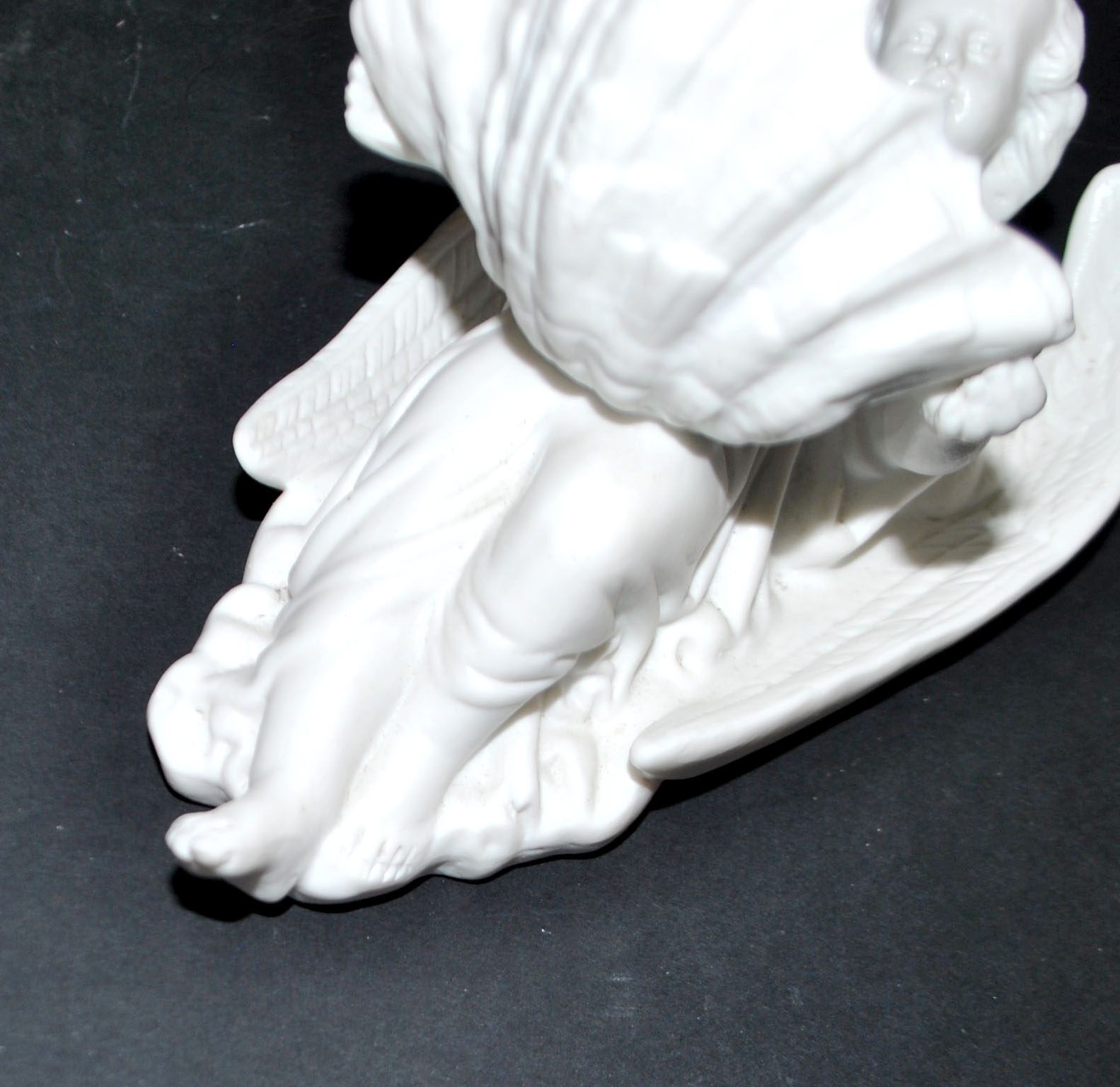 Antique angel font in biscuit porcelain from Sèvres signed MF
