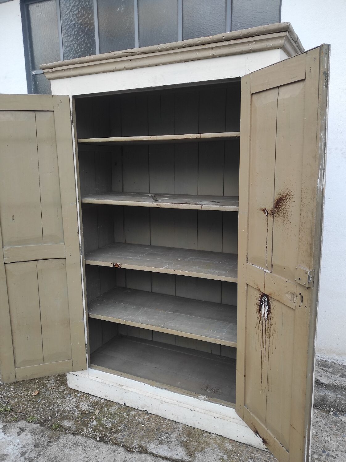 Old rustic Parisian wardrobe patinated in oak and fir