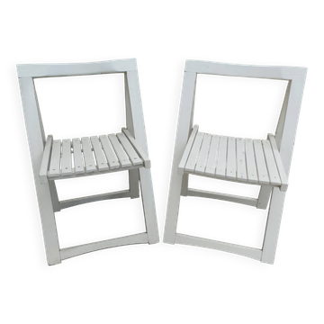 Pair of folding wooden chairs, white patina, circa 1960.