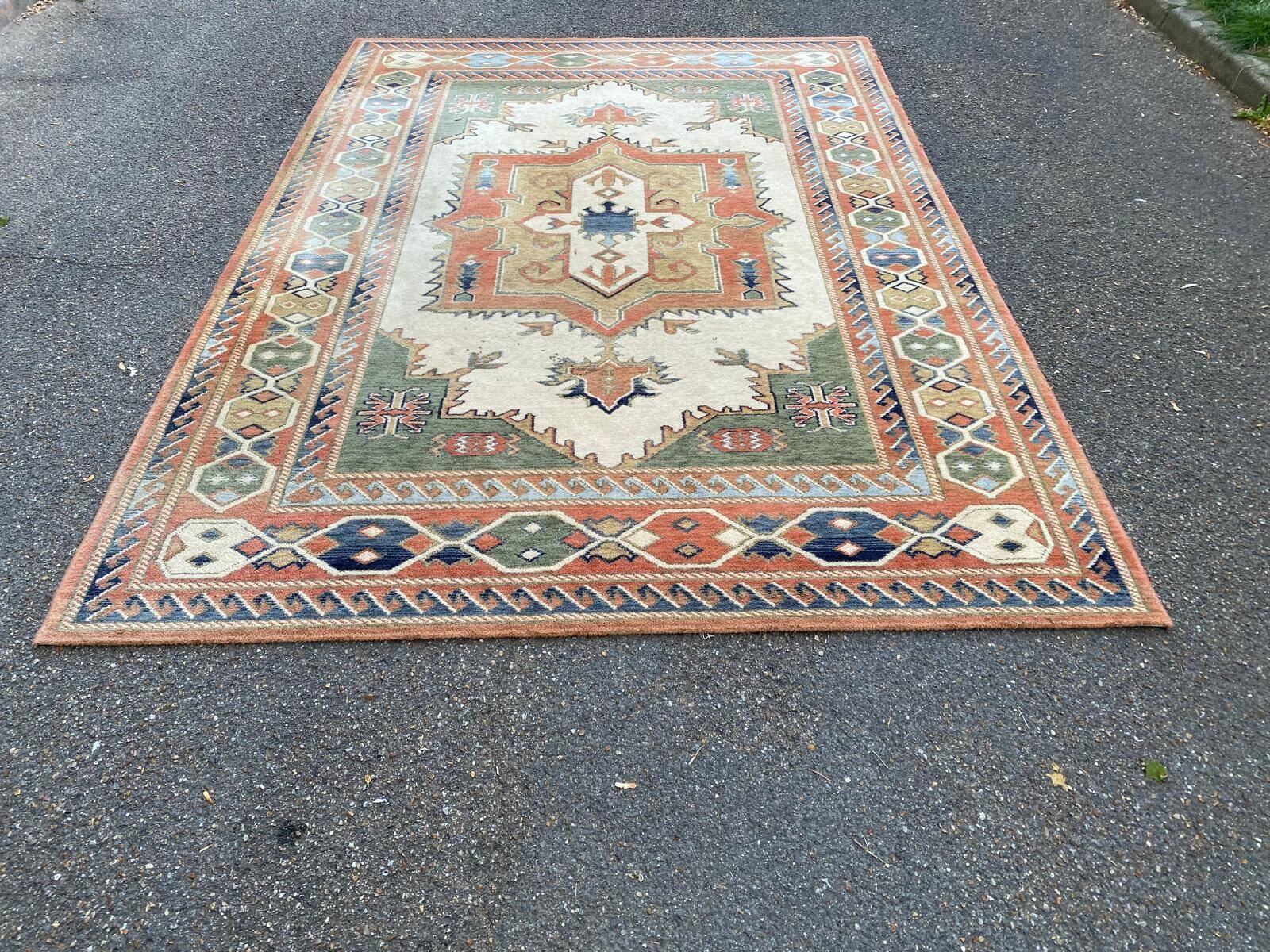 Large oriental wool rug with terracotta geometric patterns 200x300cm