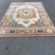 Large oriental wool rug with terracotta geometric patterns 200x300cm