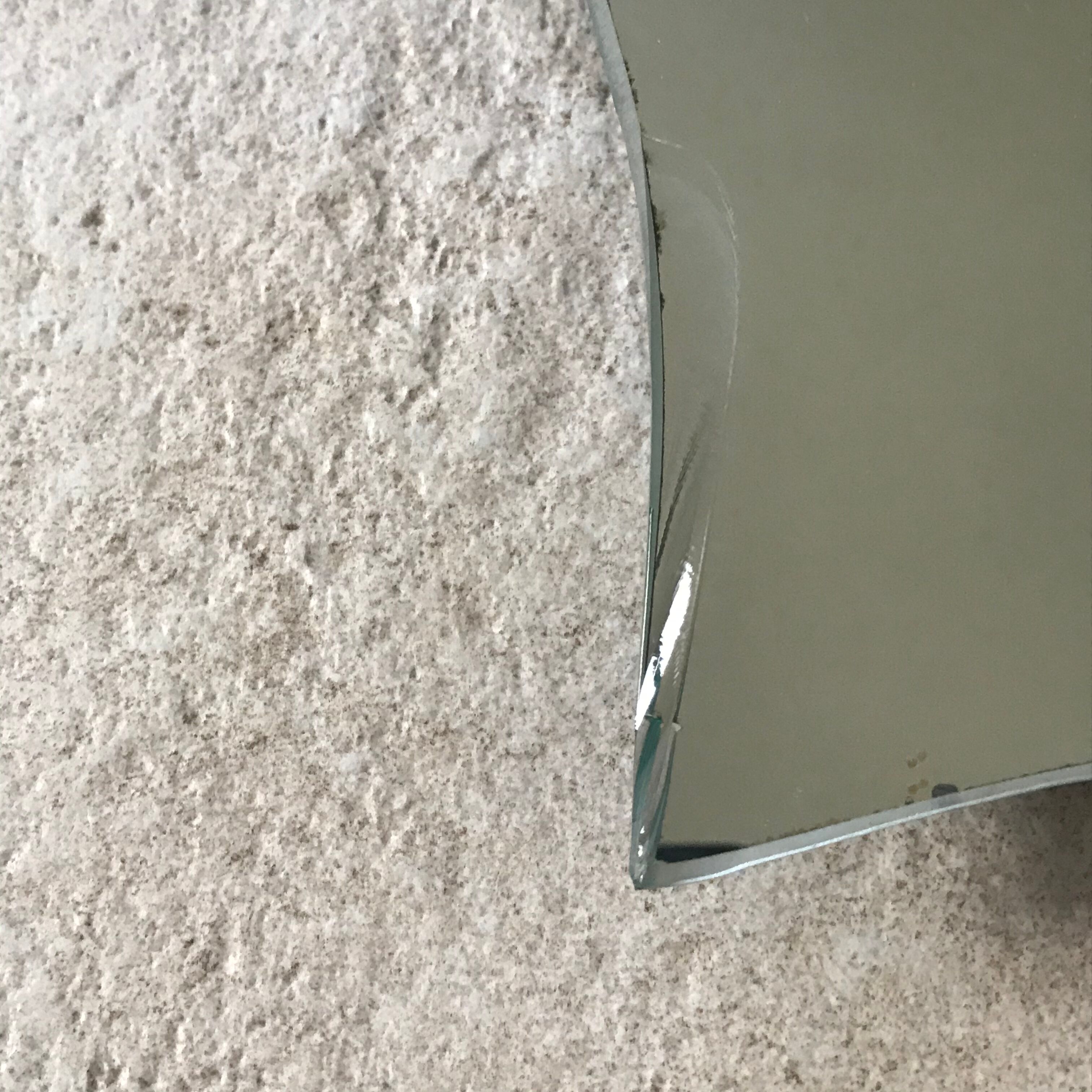 Free-form mirror signed Mathias 55x59cm