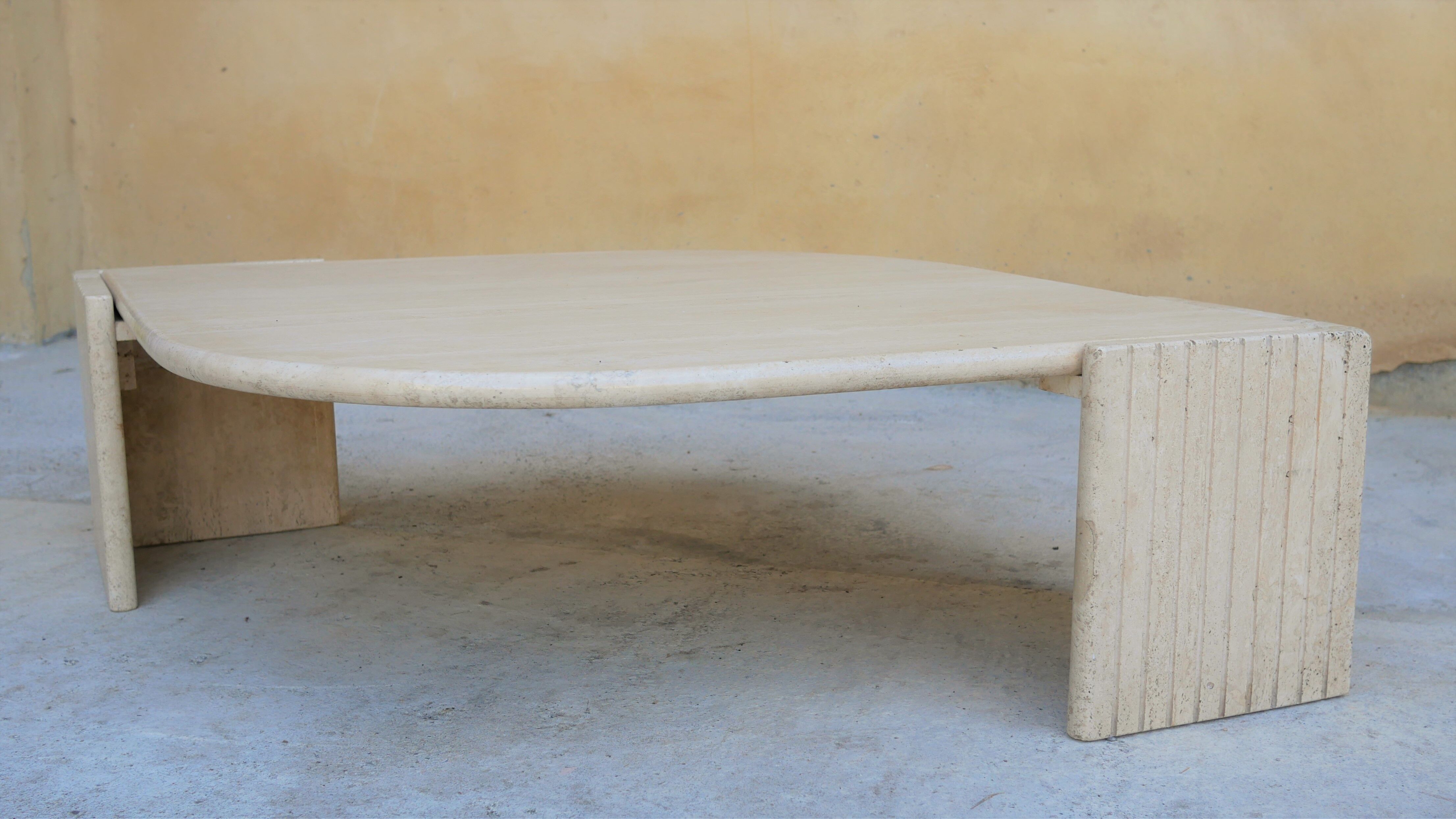 Coffee table in travertine by Roche Bobois editions