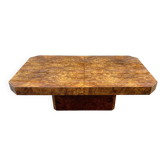 Coffee table in elm burl concealing a bar.