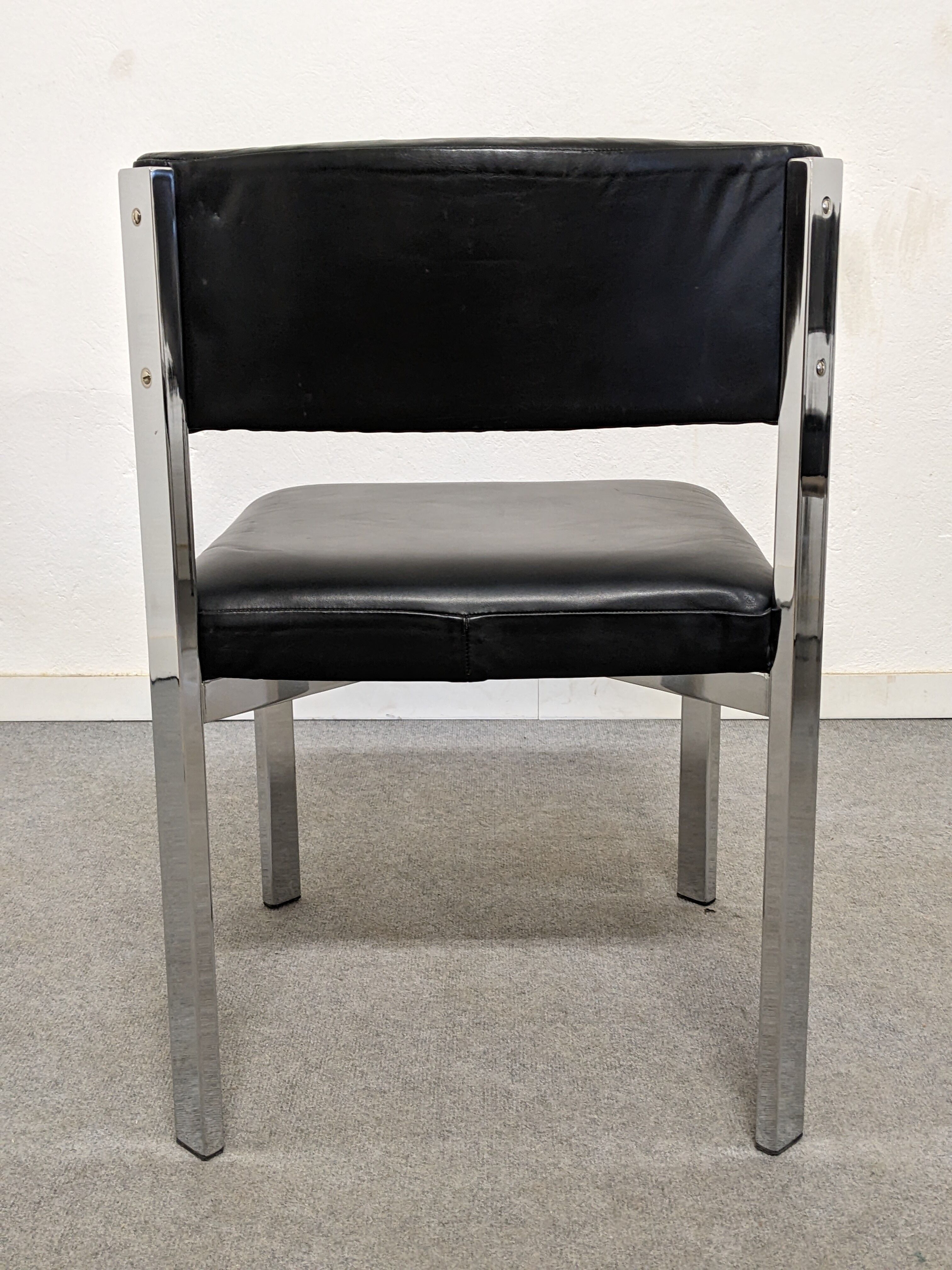 Série de 4 chaises en cuir et acier chromé Roche Bobois des années 70
