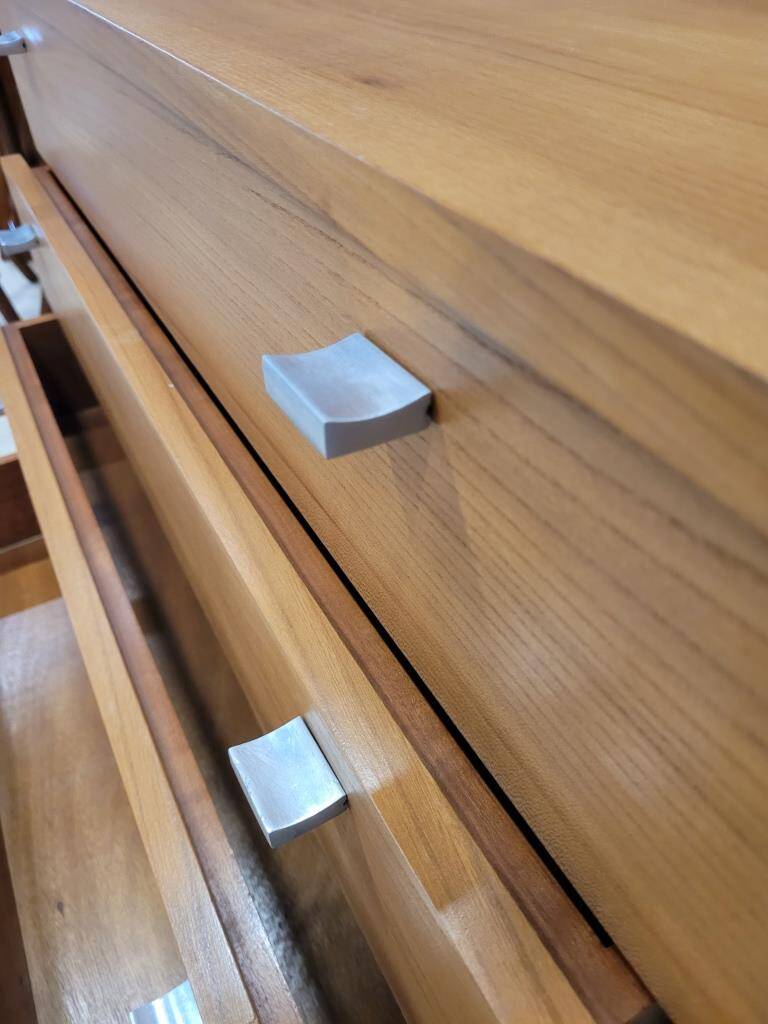Solid wood chest of drawers with chrome legs from the 1970s.
