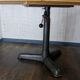 Table console pied central industriel fonte et bois