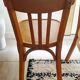 Set of 4 light wood bistro chairs stamped Baumann and Thonet.