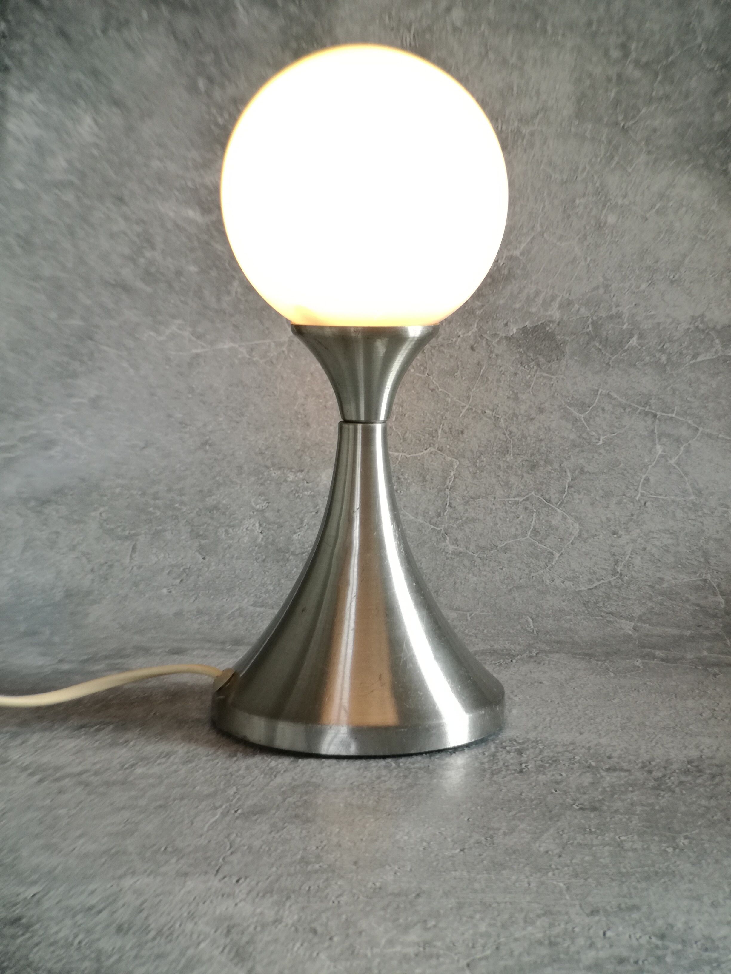 Brushed stainless steel and glass lamp from the 70s