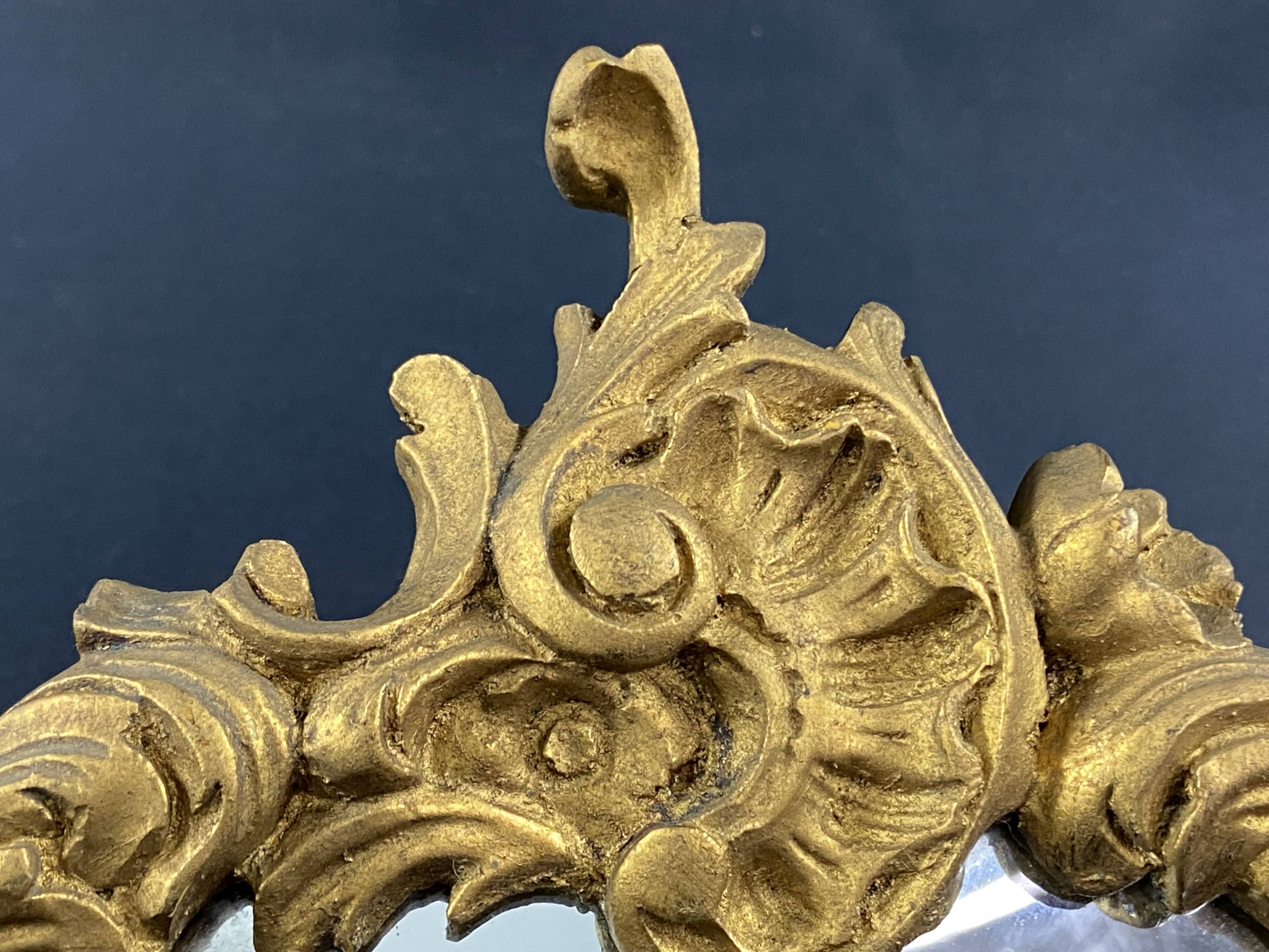 Violin mirror with shell decoration