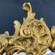 Violin mirror with shell decoration