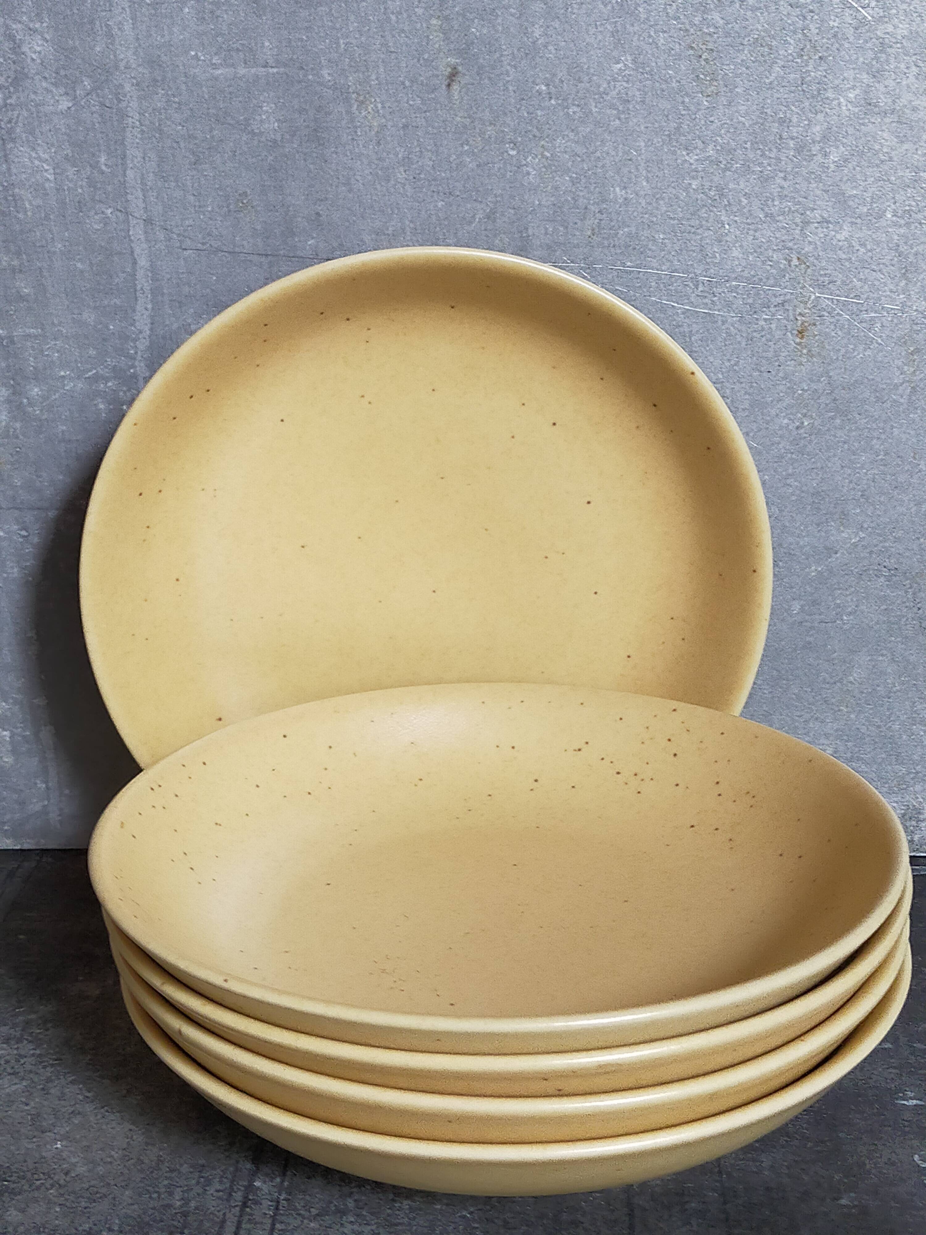 Five vintage natural stoneware soup plates