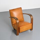 Art Deco club armchair in Havana leather, around 1940.