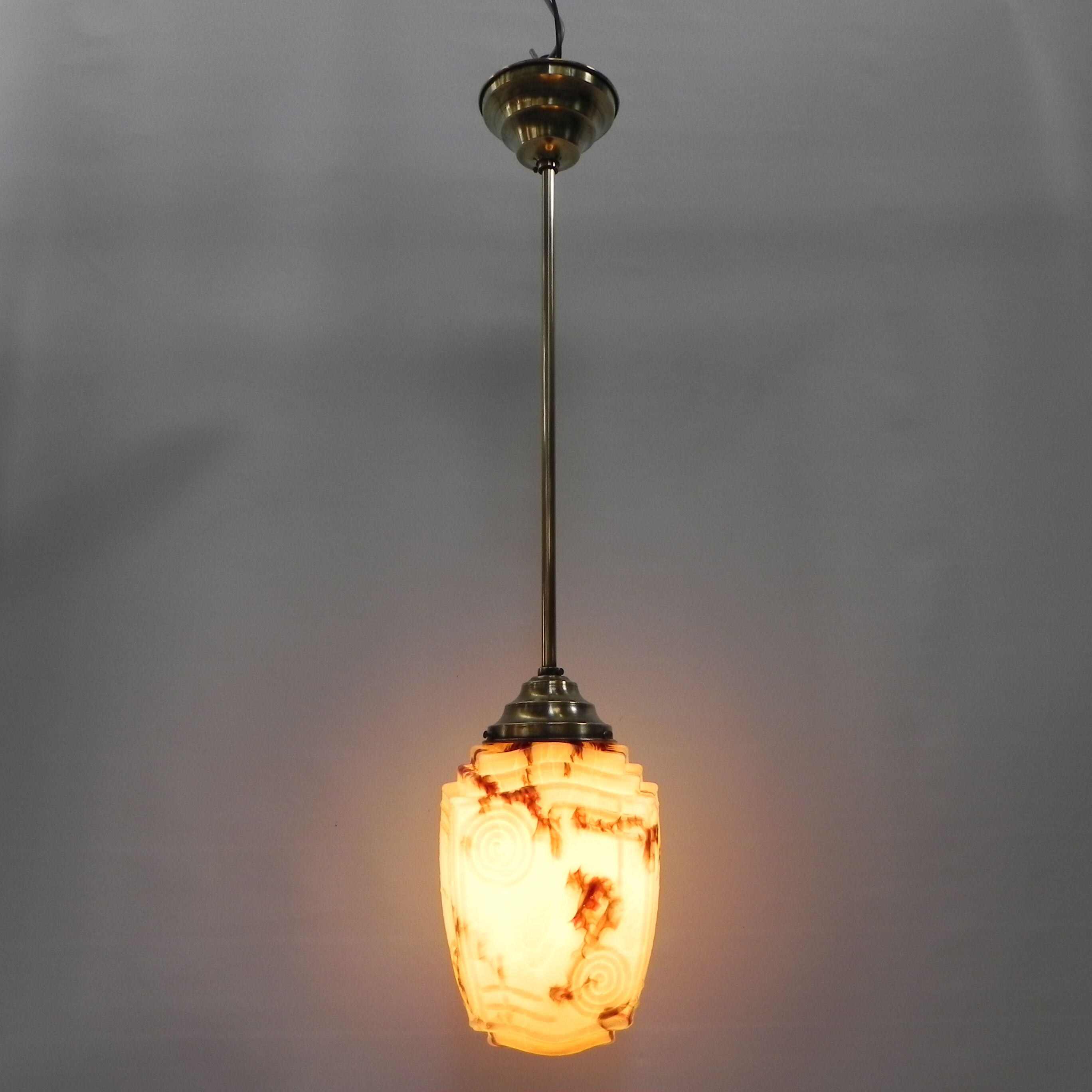 Art deco hanging lamp with marbled glass shade