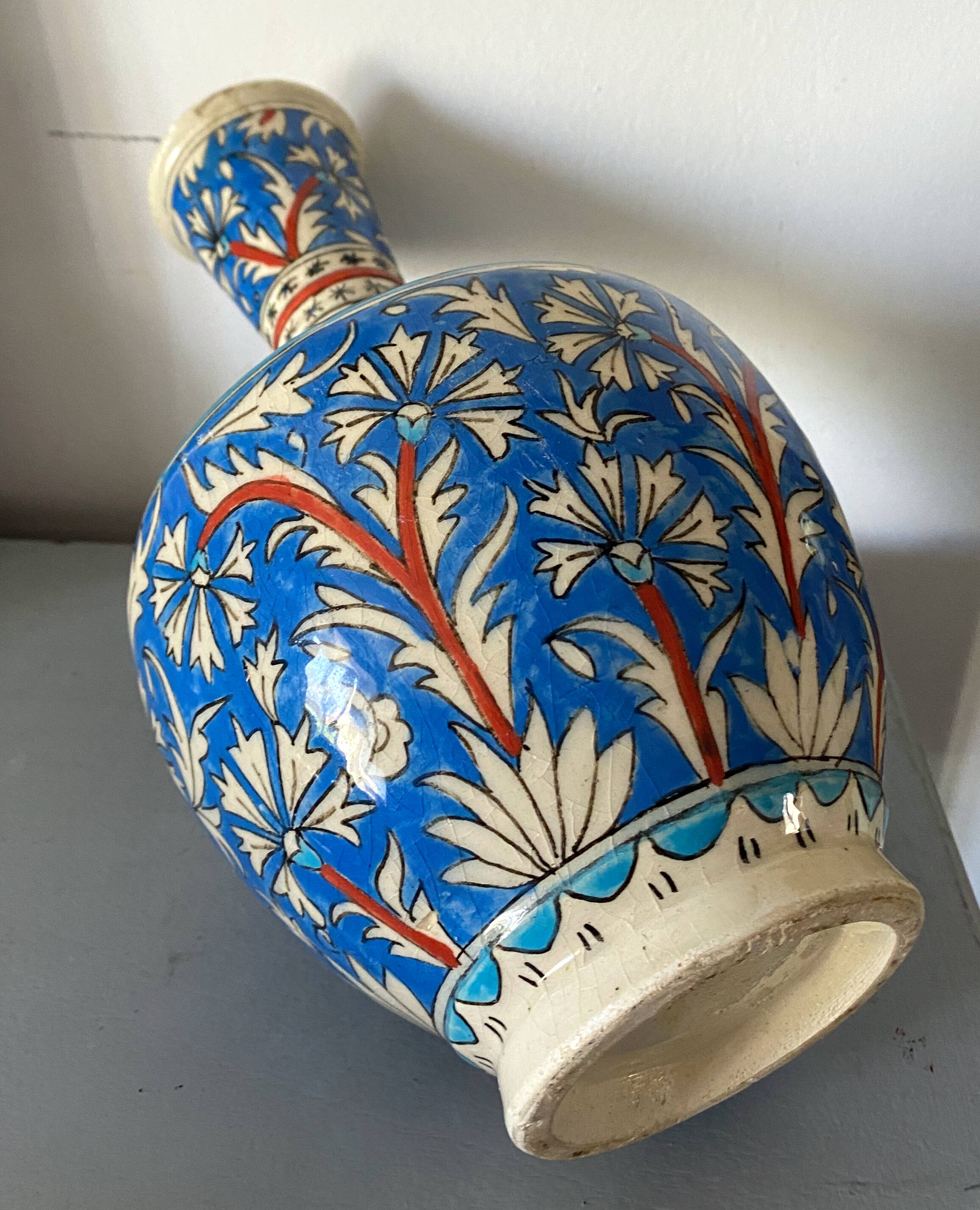 Iznic ceramic vase with blue interlacing
