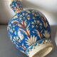 Iznic ceramic vase with blue interlacing