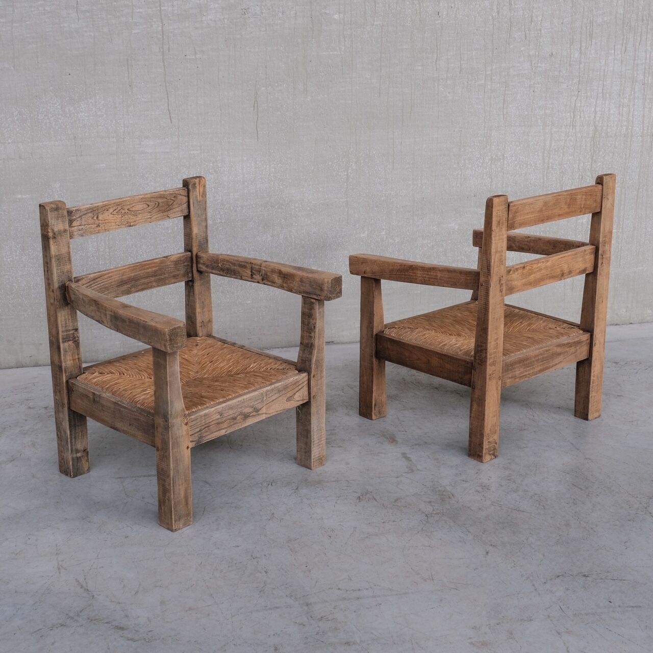 Pair of Mid-Century French Rush Primitive Oak Armchairs
