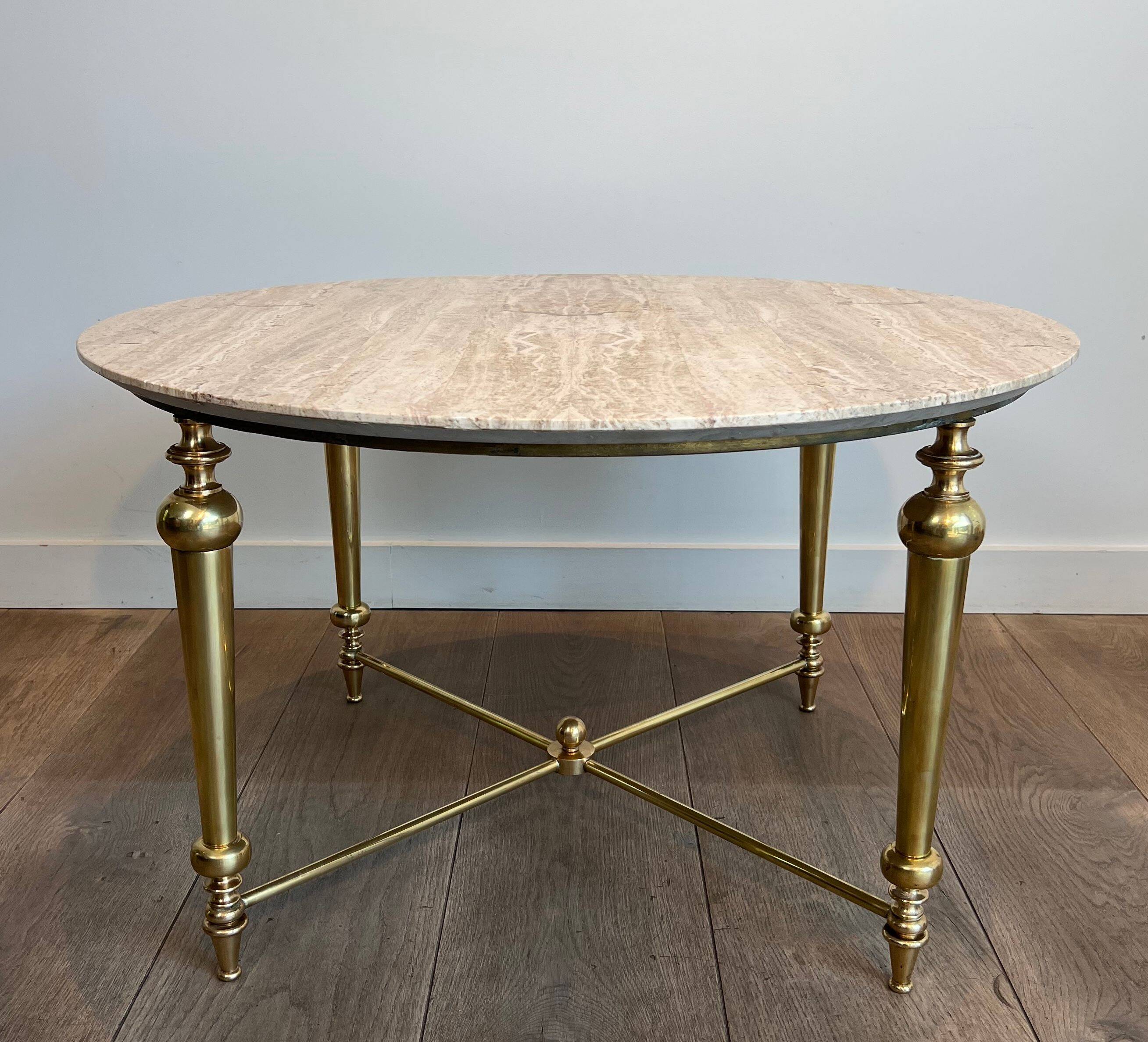 Brass coffee table with a white marble top.