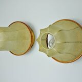 Pair of pear-shaped "cocoon" wall lights, resin and pine, Italy, 1970