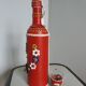 Bottle bottle leather dressing and its shot glass