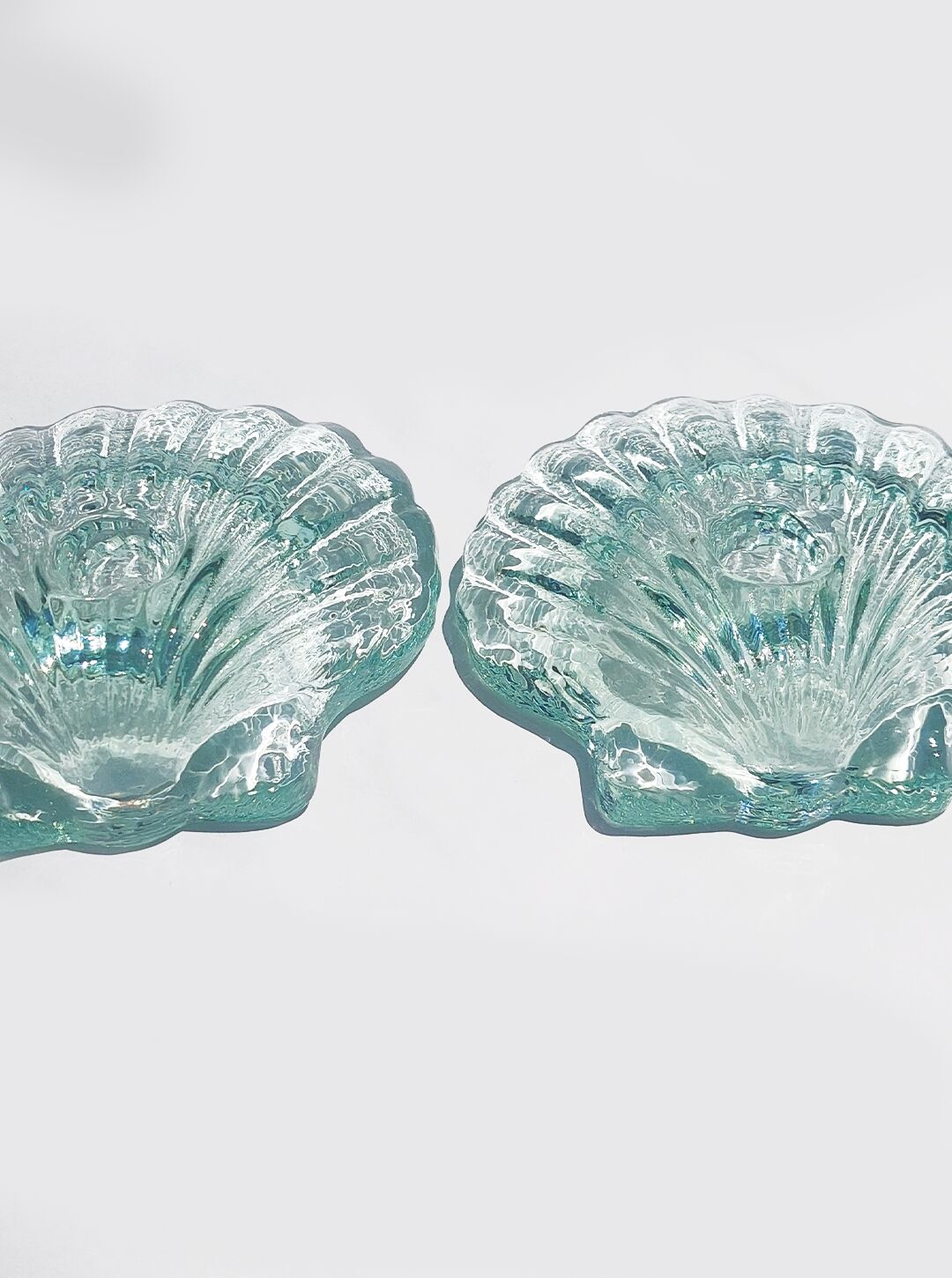 Pair of shell candlesticks