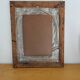 Antique mirror in gilded and copper wood