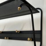 Coat rack in black lacquered metal, perforated sheet metal and brass in the style of Mathieu Matégot
