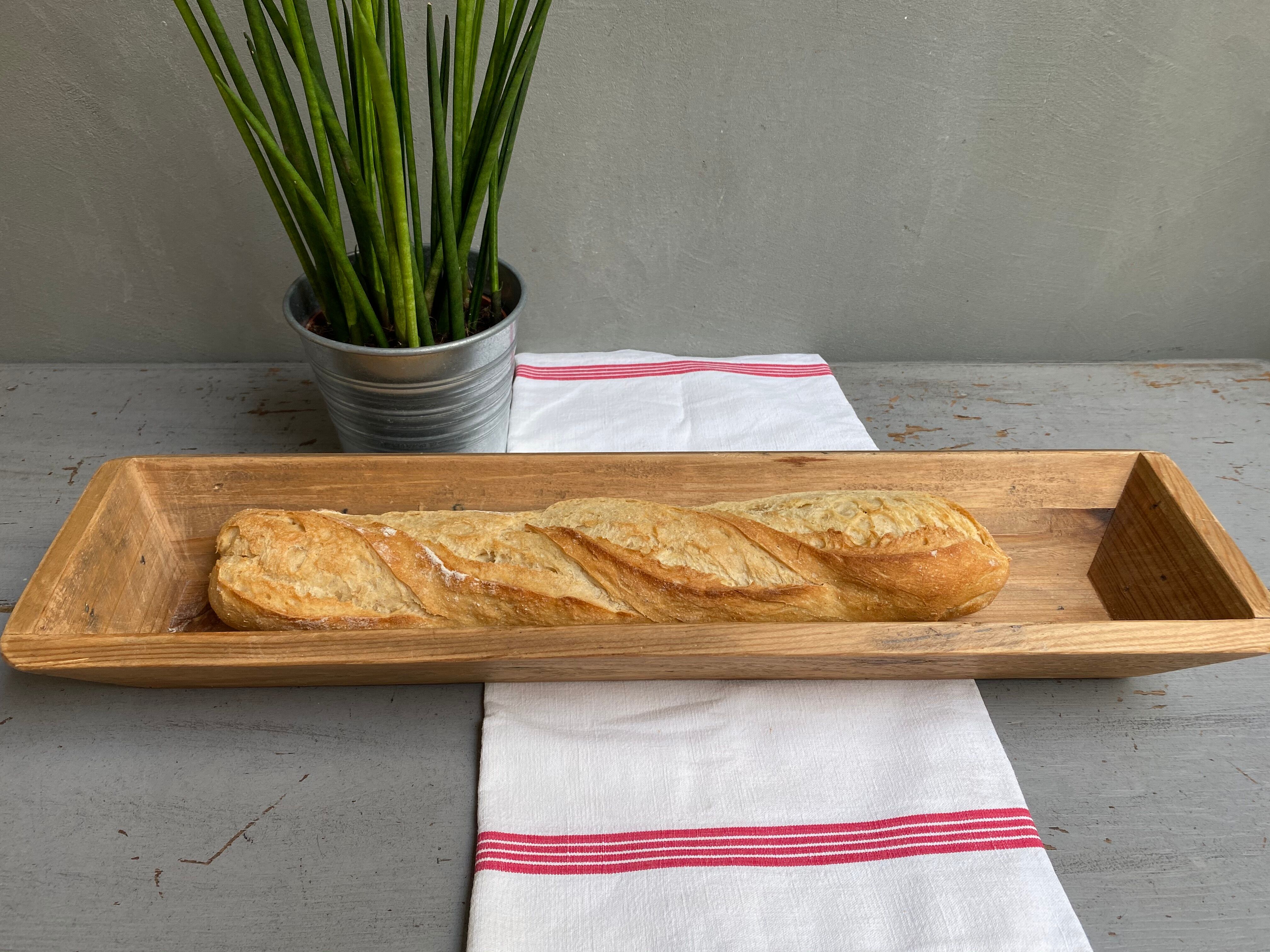 Raw wooden baker's basket