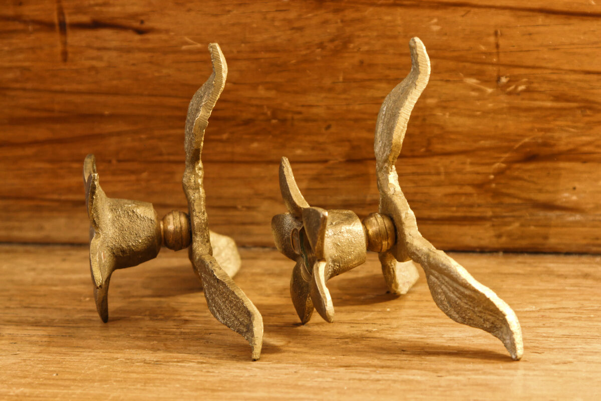 Pair of brass candle holders, flowers