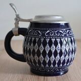 Beer mug with tin lid