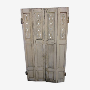 Pair of old painted wooden shutters