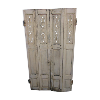 Pair of old painted wooden shutters