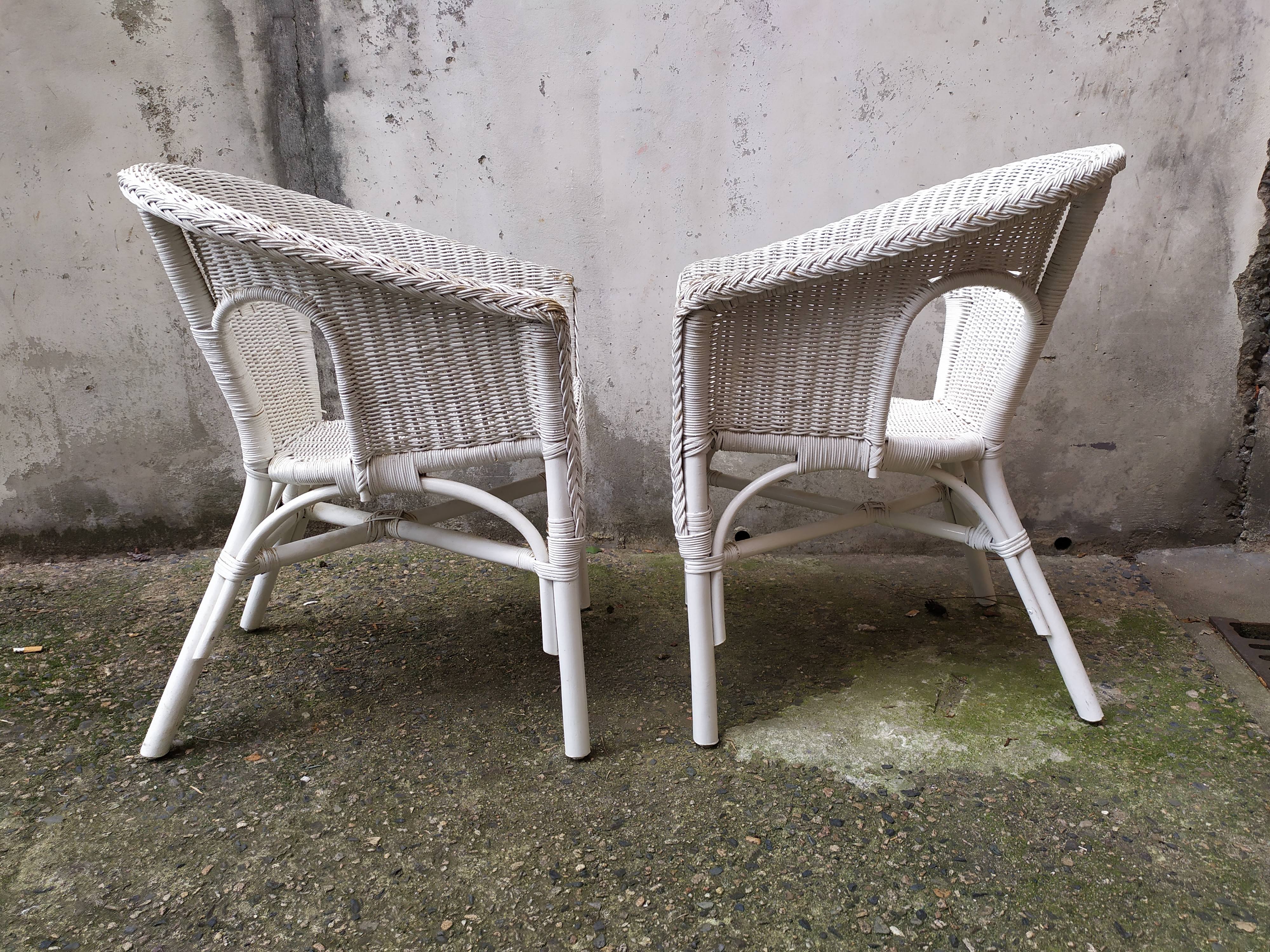 Pair of vintage rattan chairs