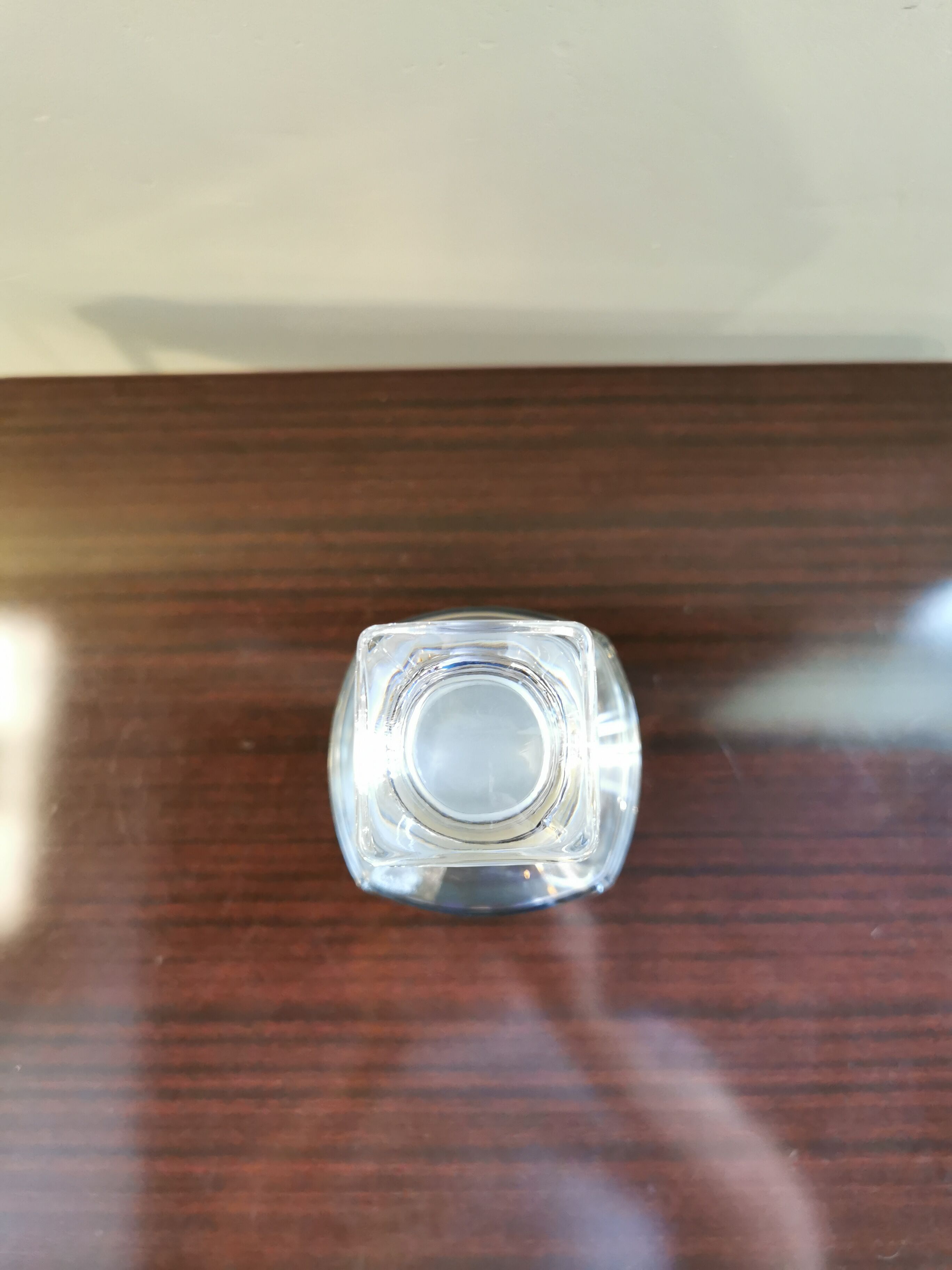 Square vintage decanter made of transparent glass