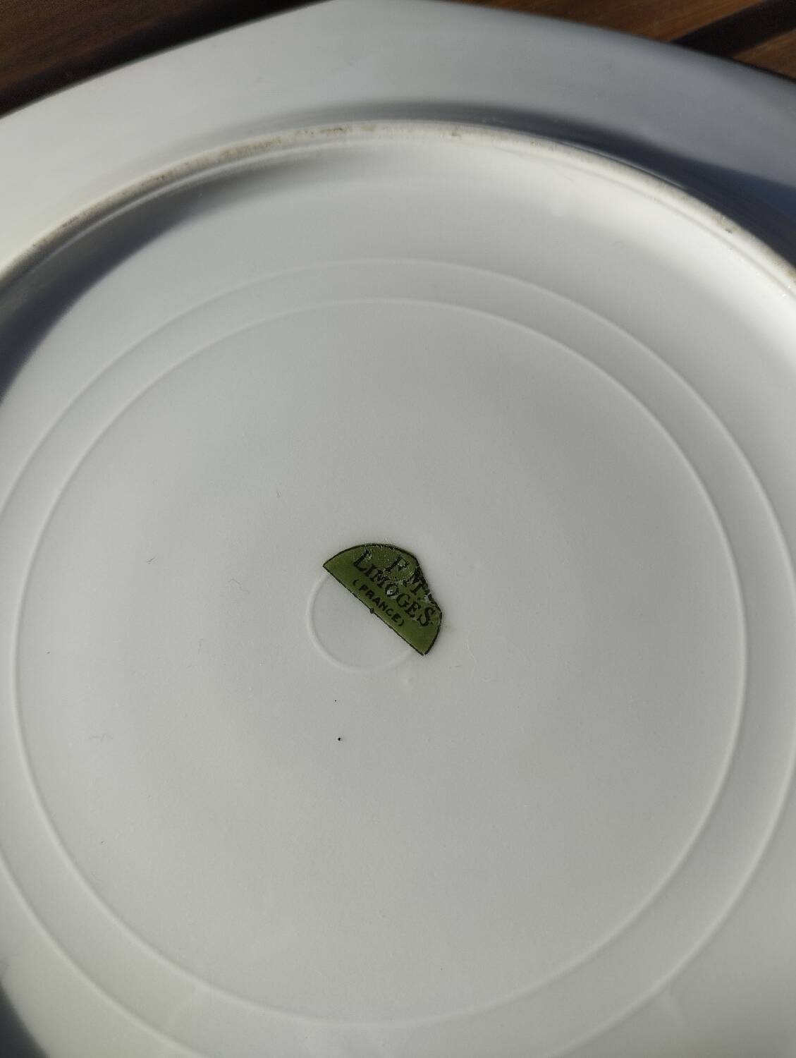 4 flat plates in Limoges porcelain