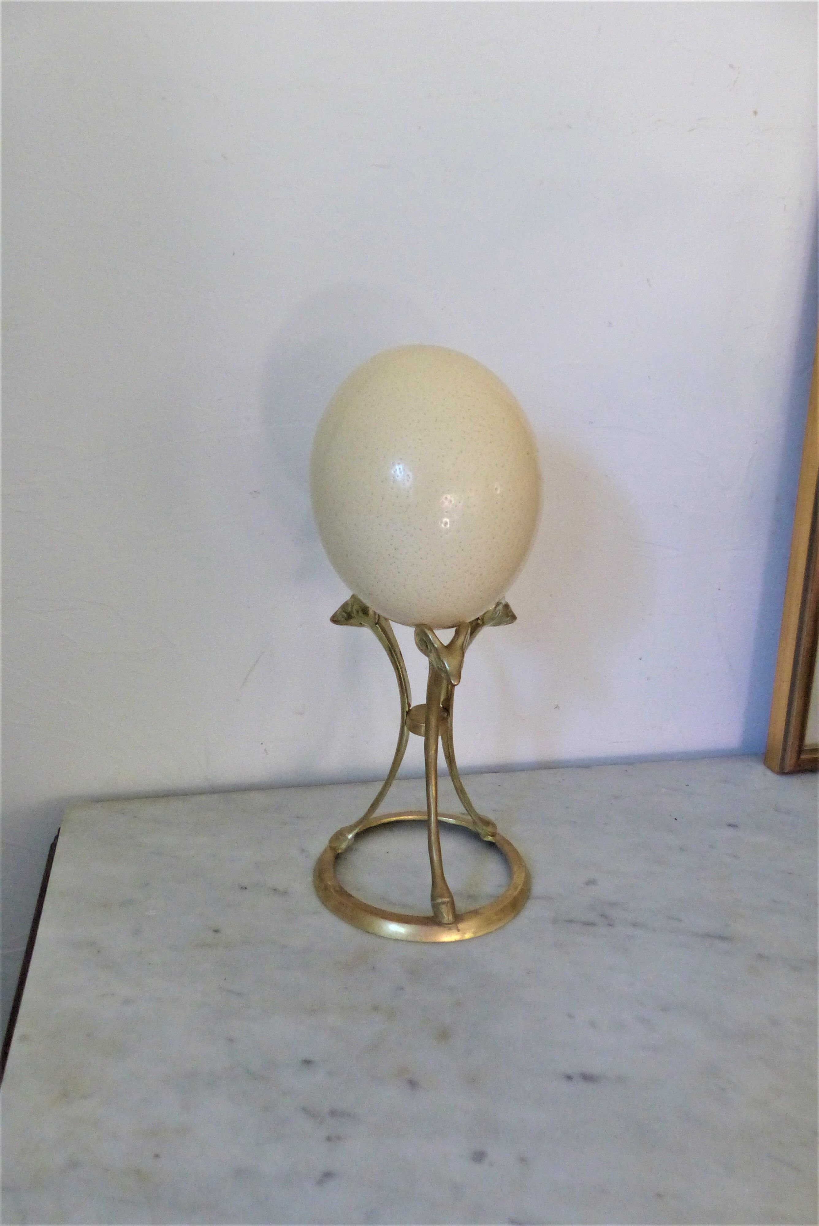 Curiosity object tripod brass and ostrich egg