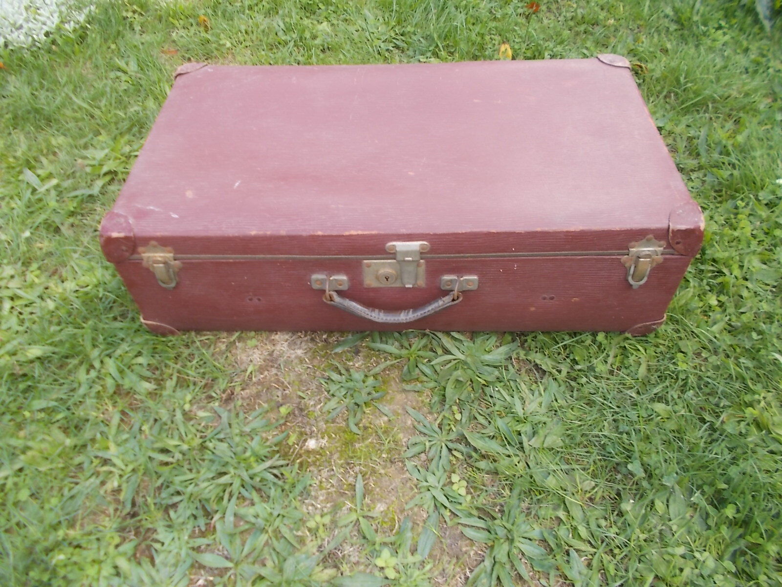 Vintage burgundy suitcase