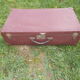 Vintage burgundy suitcase