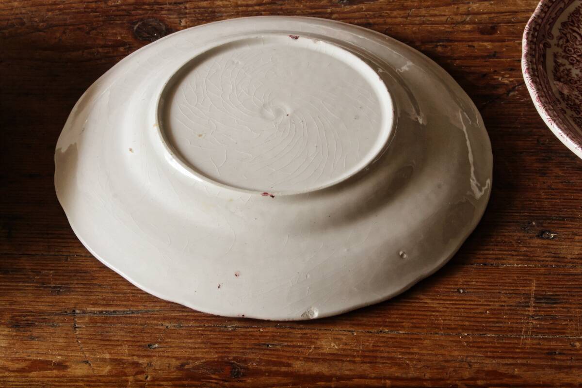 Set of 11 dessert plates in English earthenware.