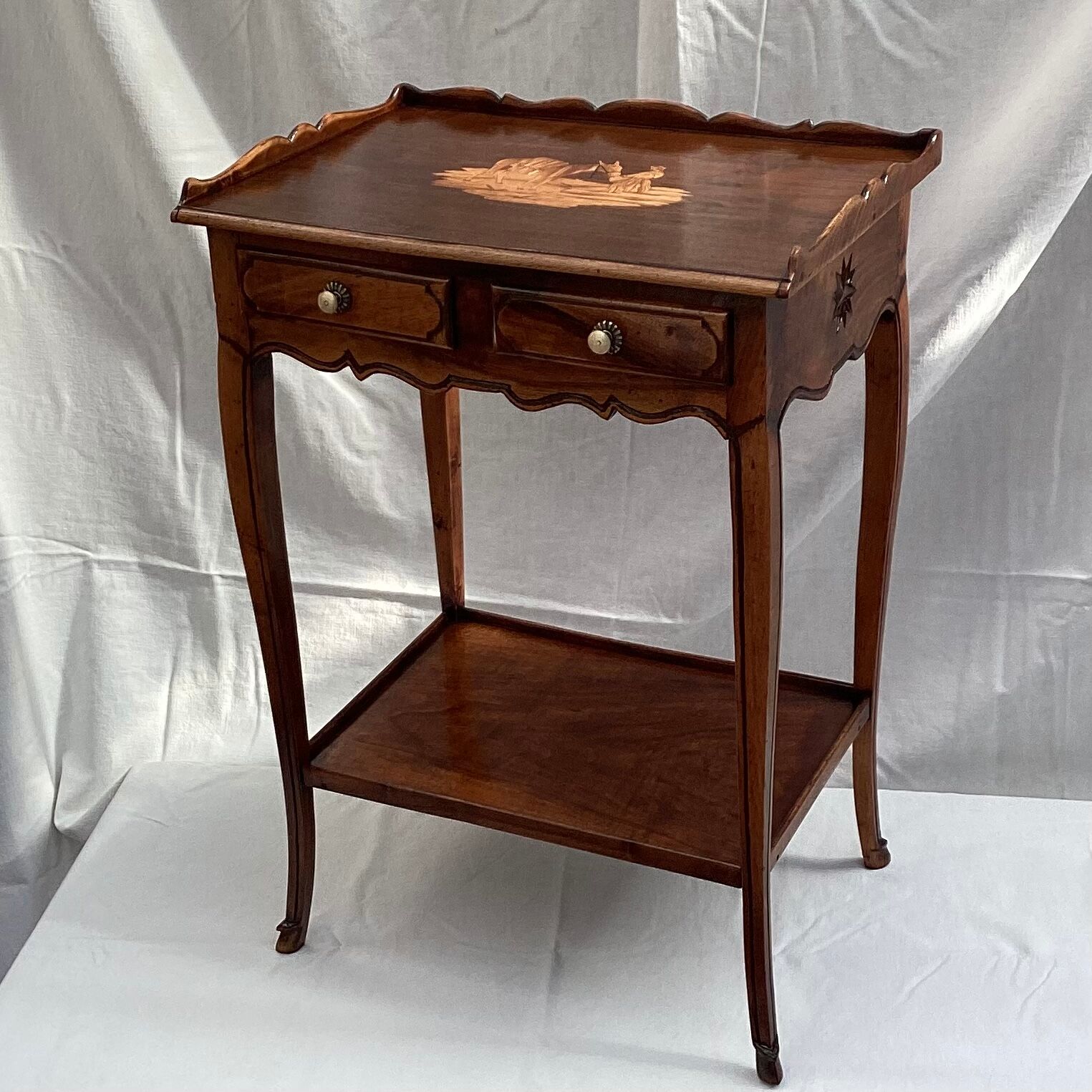 Old wooden side table with marquetry