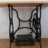 Living room console with sewing machine foot