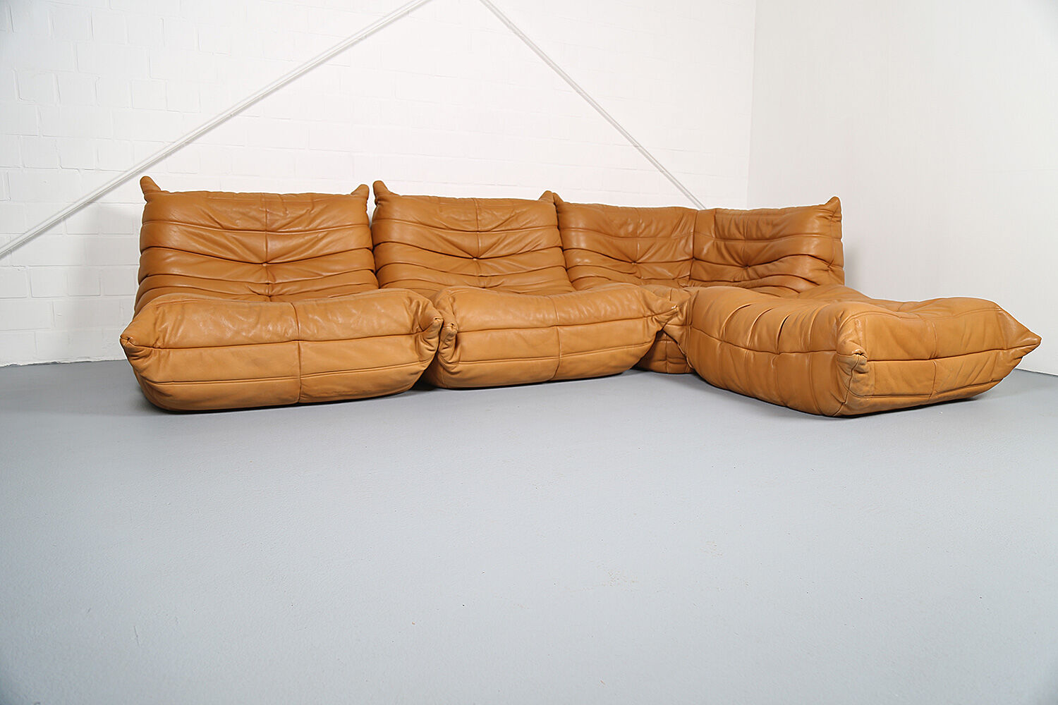 Cognac leather Ligne Roset Togo set from 2010 designed by Michel Ducaroy